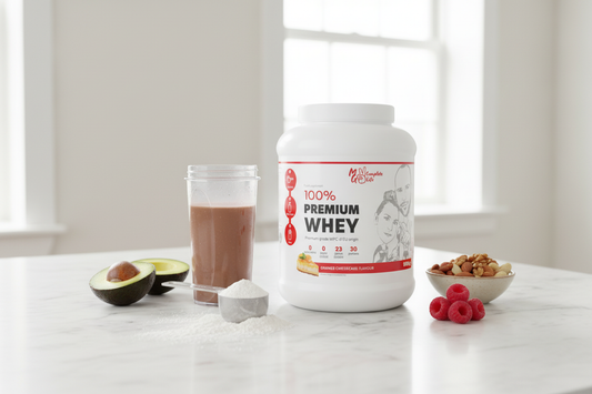 MG Complete Life 100% Premium Whey Protein 900g – keto lifestyle shot on marble with shaker and nuts