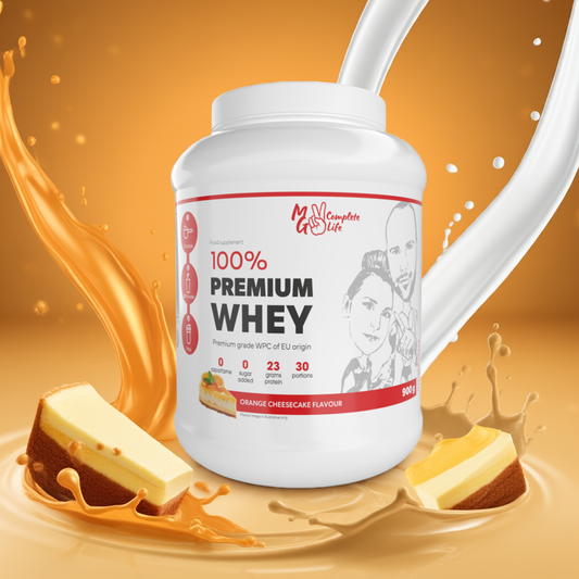 Container of 100% Premium Whey protein powder with orange cheesecake flavour on a yellow background
